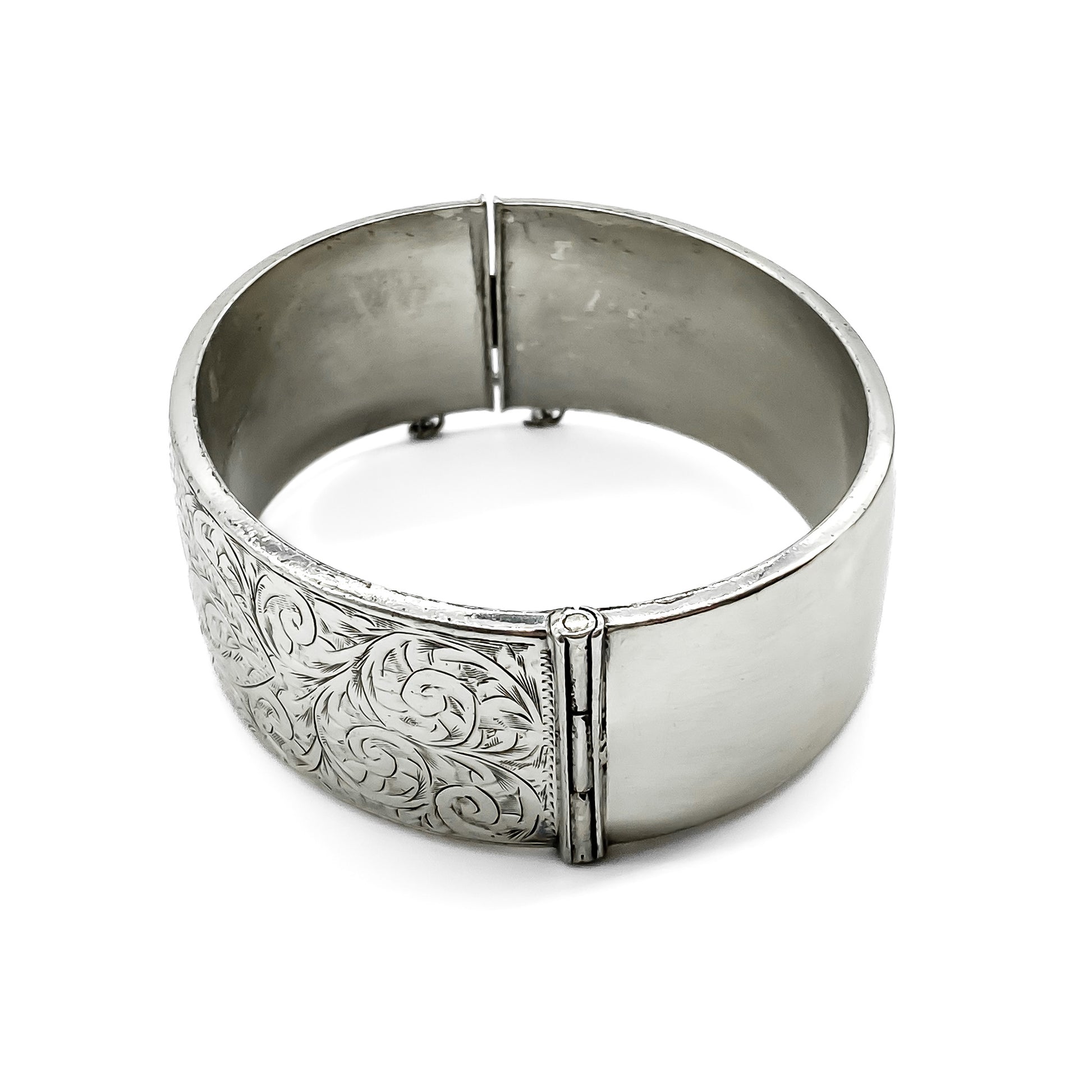 Beautifully engraved sterling silver bangle. Wax filled. Birmingham 1948