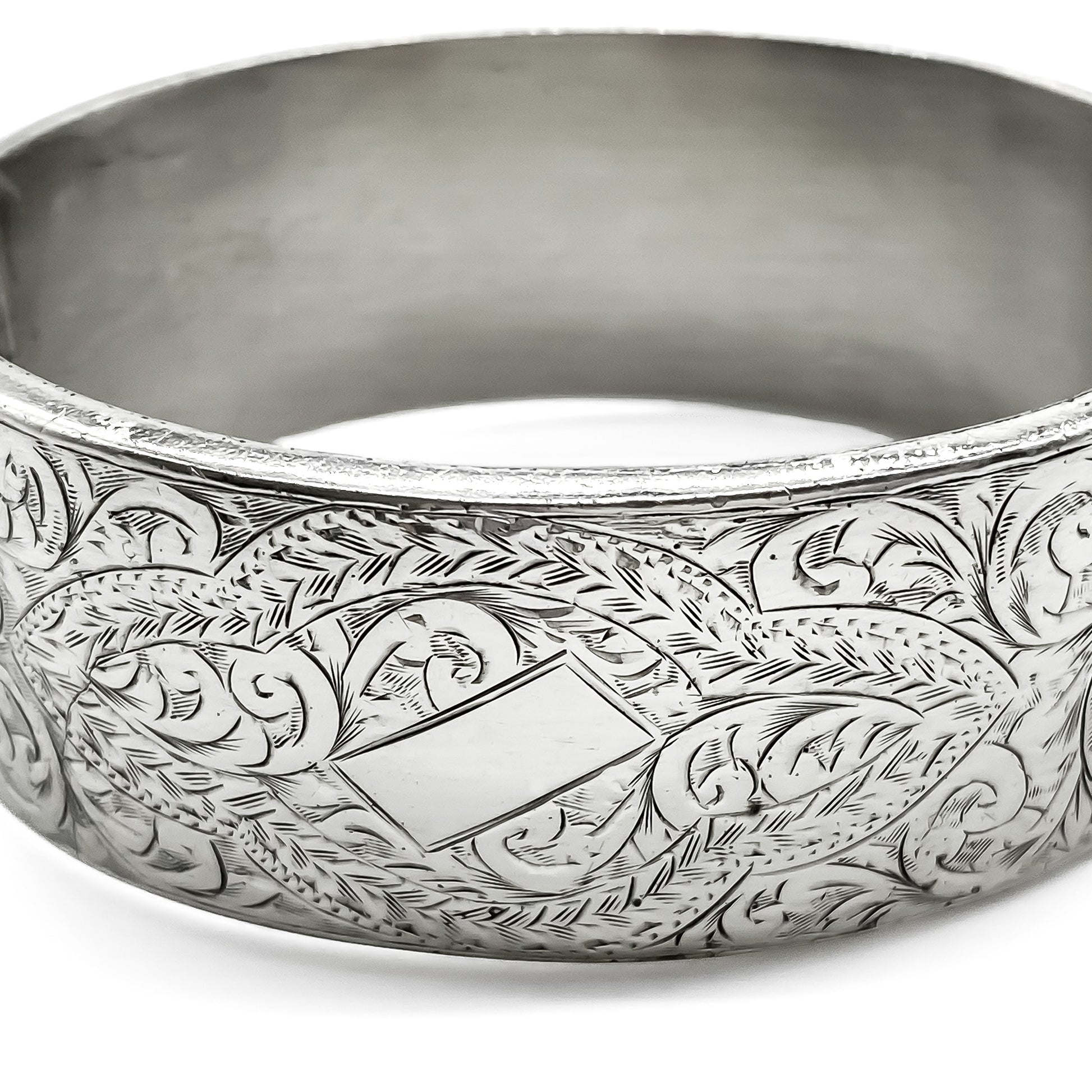 Beautifully engraved sterling silver bangle. Wax filled. Birmingham 1948
