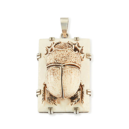 Unique, large bone pendant with a resin scarab beetle, in a sterling silver setting.