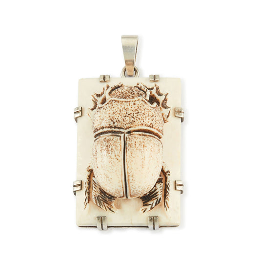 Unique, large bone pendant with a resin scarab beetle, in a sterling silver setting.