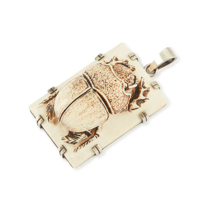 Unique, large bone pendant with a resin scarab beetle, in a sterling silver setting.