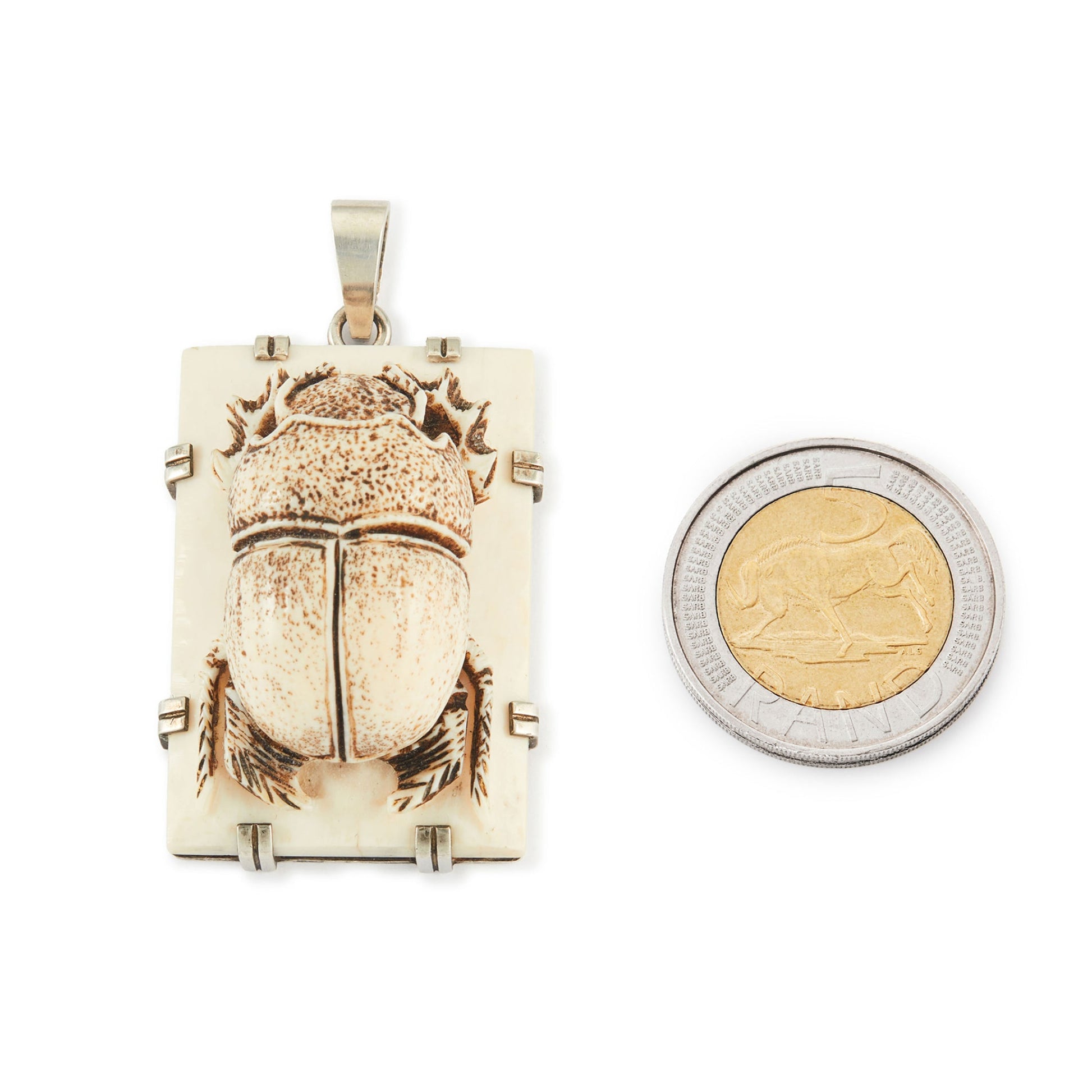 Unique, large bone pendant with a resin scarab beetle, in a sterling silver setting.