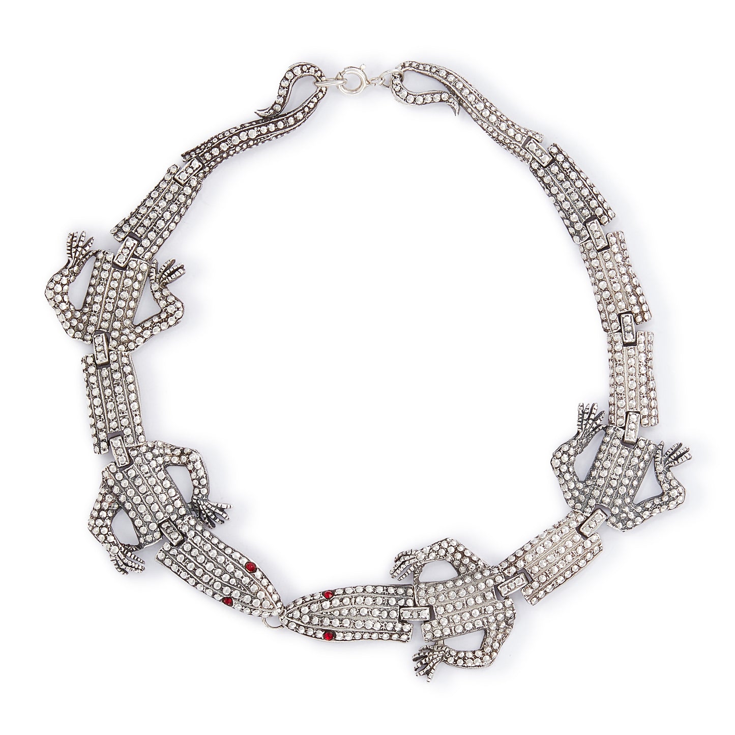 Highly sought after articulated sterling silver Butler and Wilson necklace consisting of two connected lizards with red paste eyes. The necklace can also be divided into a shoulder brooch and a 16cm bracelet, making this a very versatile and fun piece.