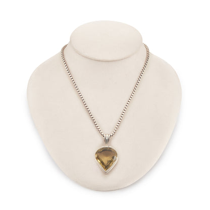 Stunning sterling silver pendant set with a deep-yellow, beautifully faceted, 45ct citrine, on a sterling silver box link chain.