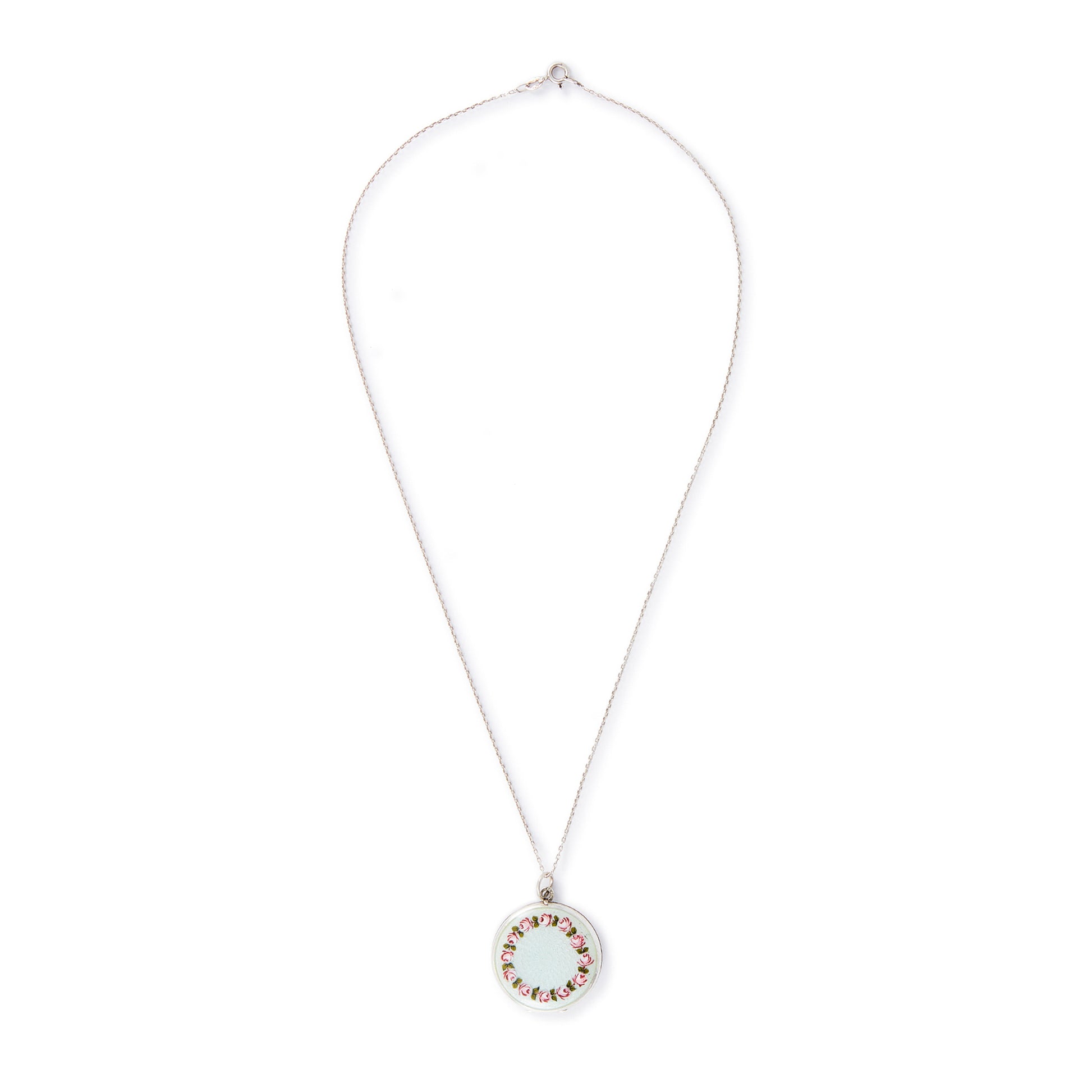 Pretty vintage sterling silver locket with an enamel floral design on a light blue background, on a sterling silver chain.