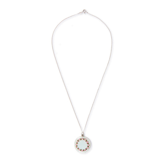 Pretty vintage sterling silver locket with an enamel floral design on a light blue background, on a sterling silver chain.