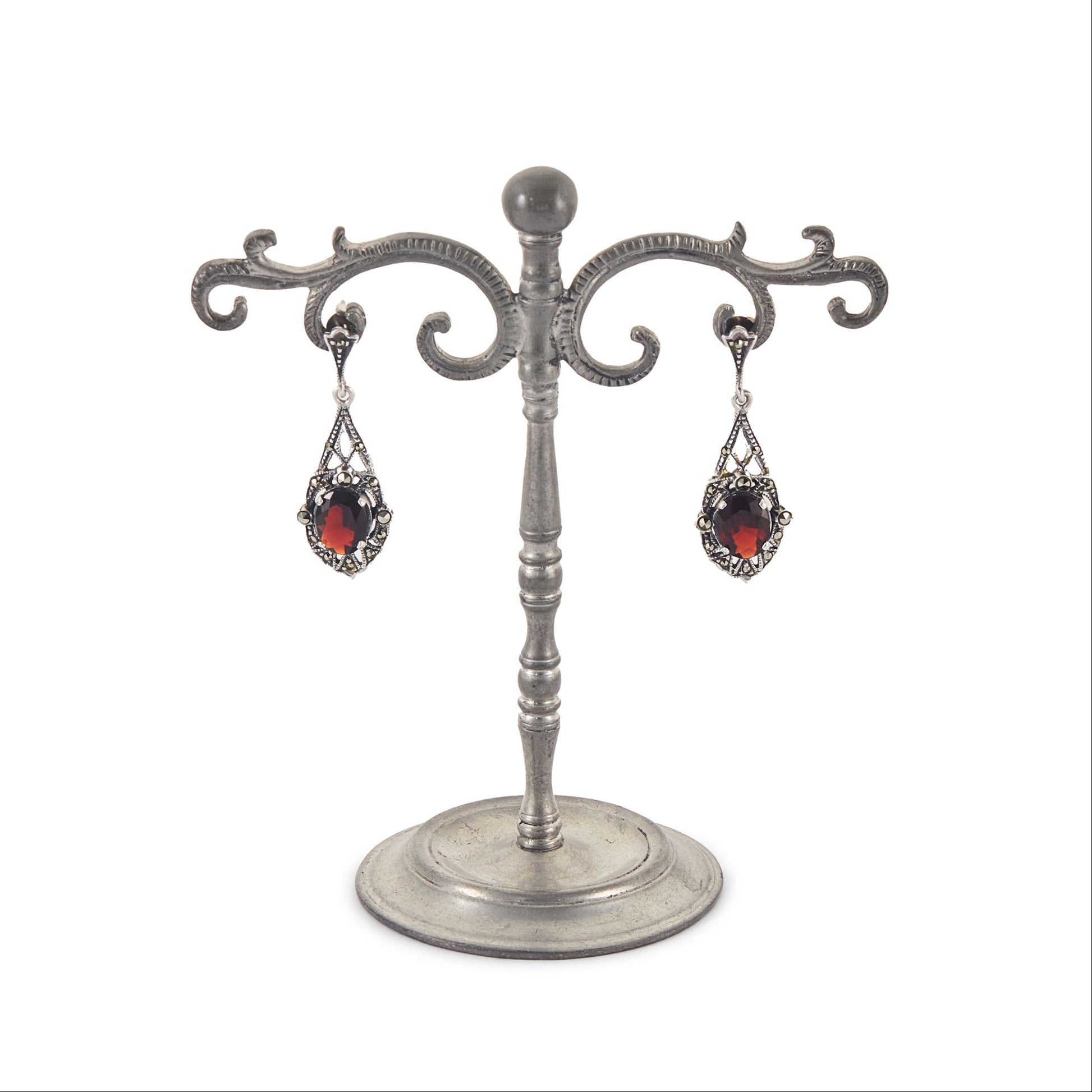 Stunning sterling silver drop earrings, each set with a beautifully faceted garnet and marcasite stones.