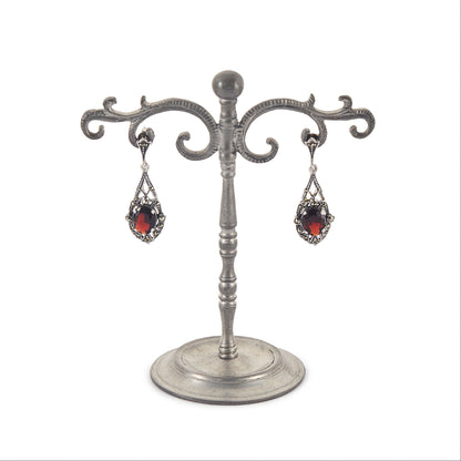 Stunning sterling silver drop earrings, each set with a beautifully faceted garnet and marcasite stones.