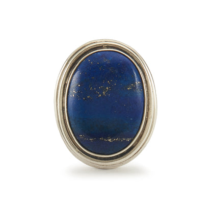 Stylish sterling silver ring with a large, deep-blue lapis lazuli cabochon in a tube setting.