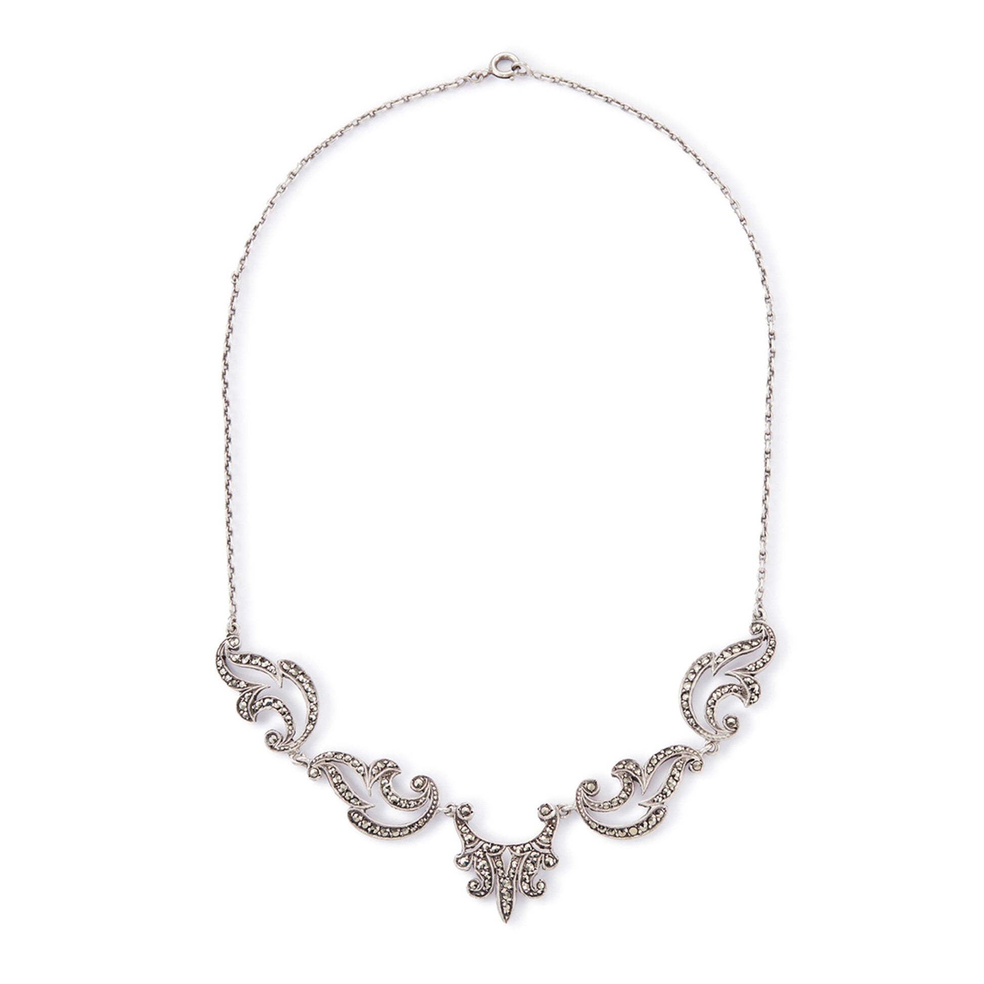Lovely sterling silver scalloped necklace with claw-set marcasites. Made in France.
Circa 1930s