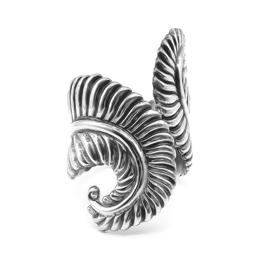 Gorgeous sterling silver Mexican repousse clamper bangle with a fern leaf design. Bangle opens to fit most wrists. Taxco. Eagle hallmark