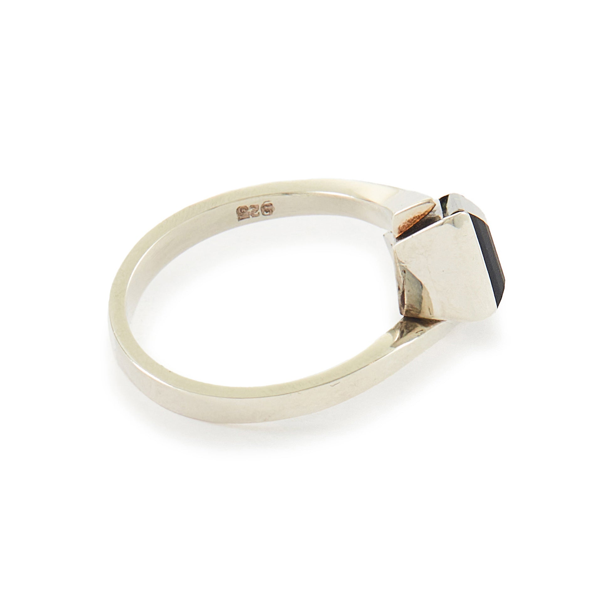 Striking Modernist sterling silver ring set with a beautiful, deep-green tourmaline gemstone.