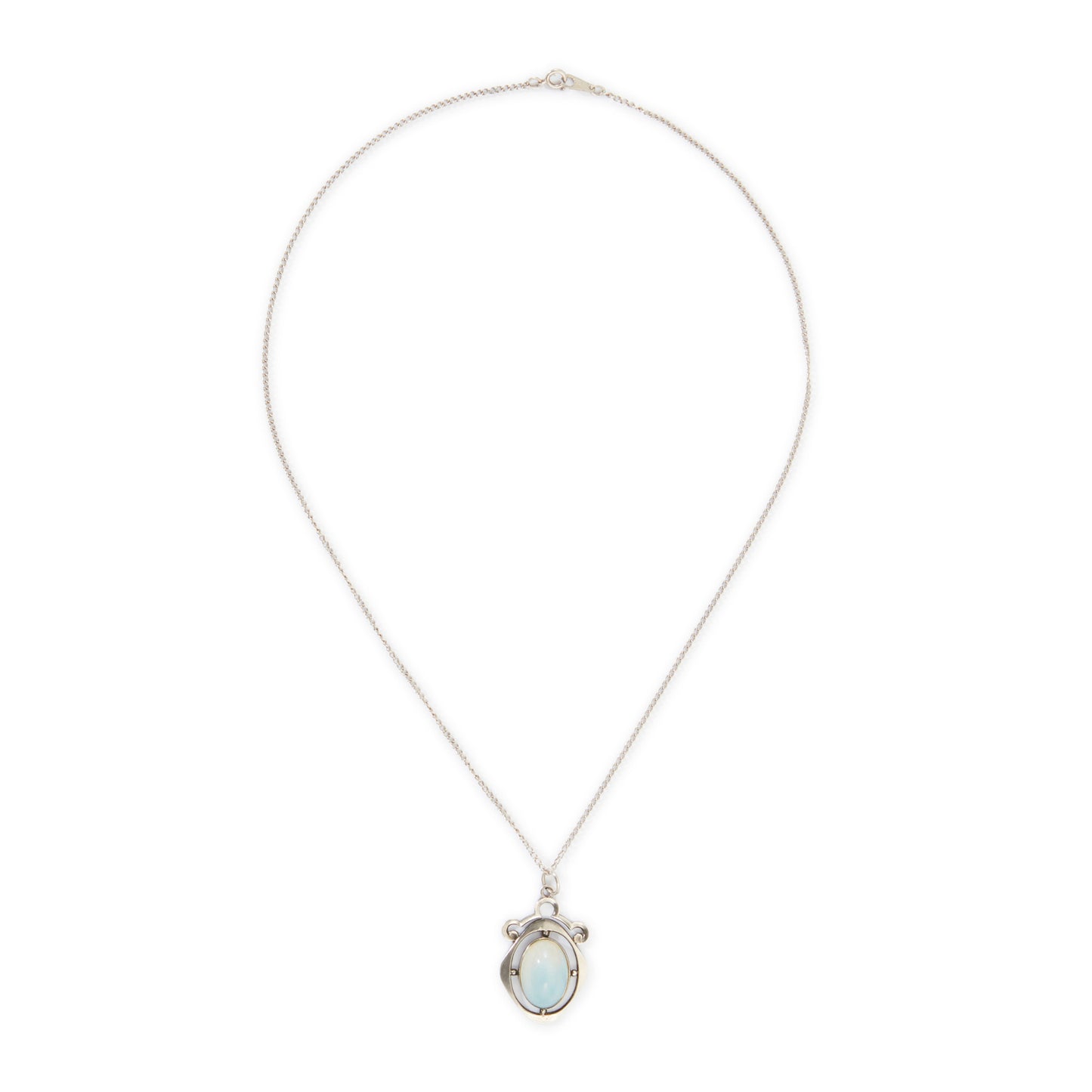 Classic 1930s sterling silver pendant set with a beautiful cabochon oval moonstone on a later silver chain.