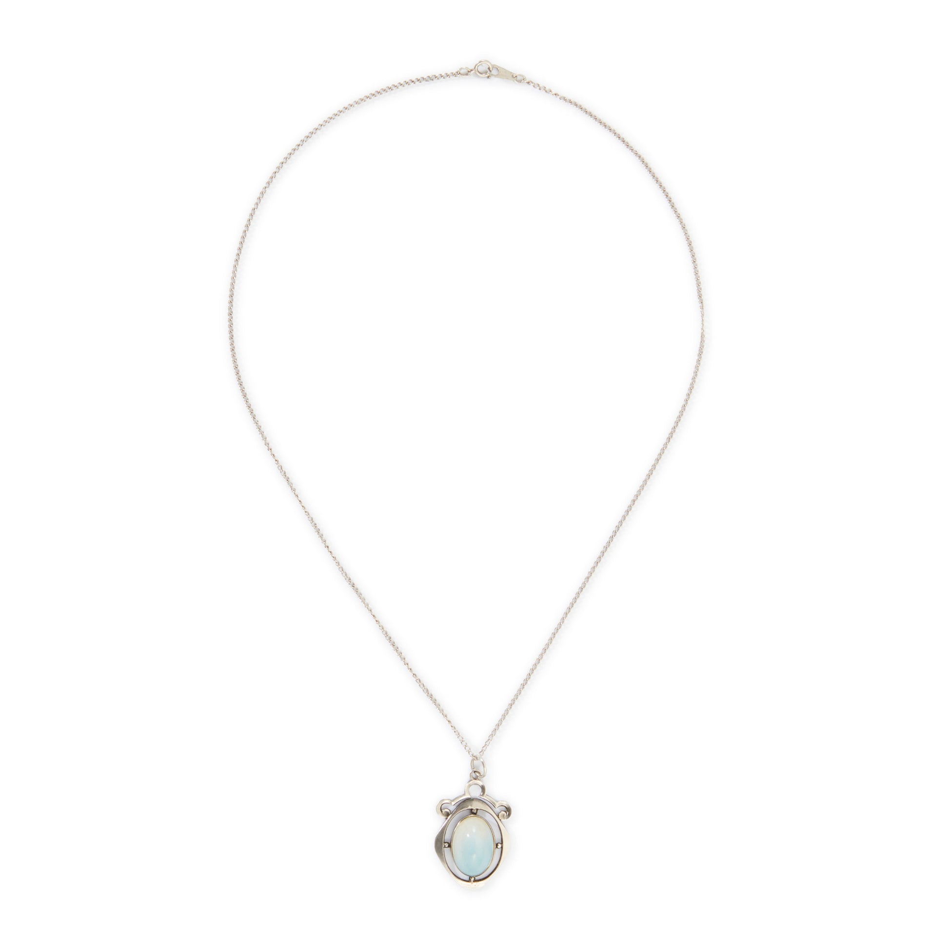 Classic 1930s sterling silver pendant set with a beautiful cabochon oval moonstone on a later silver chain.