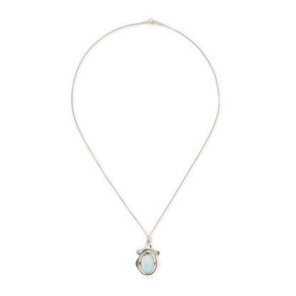 Classic 1930s sterling silver pendant set with a beautiful cabochon oval moonstone on a later silver chain.