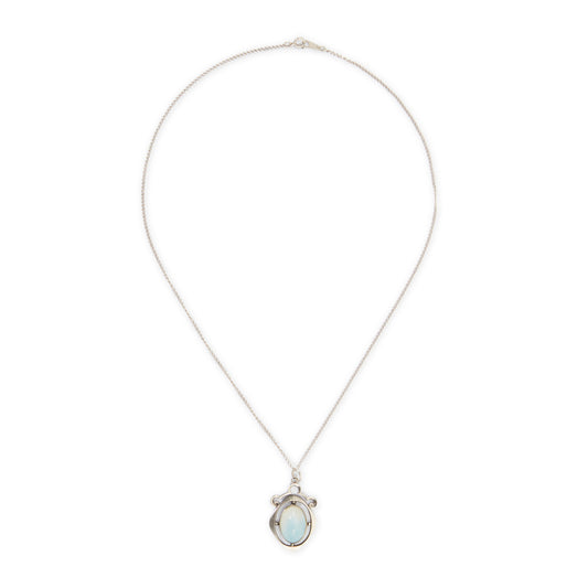 Classic 1930s sterling silver pendant set with a beautiful cabochon oval moonstone on a later silver chain.