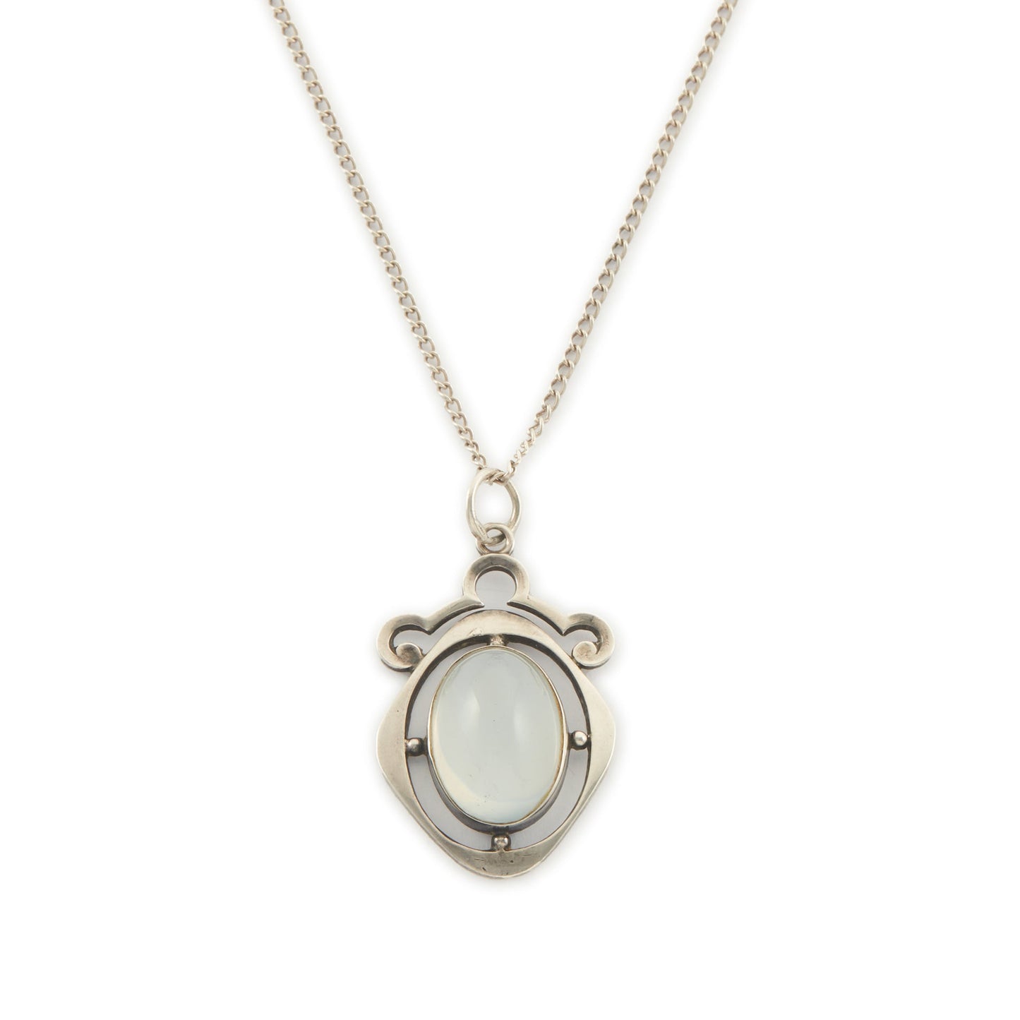 Classic 1930s sterling silver pendant set with a beautiful cabochon oval moonstone on a later silver chain.
