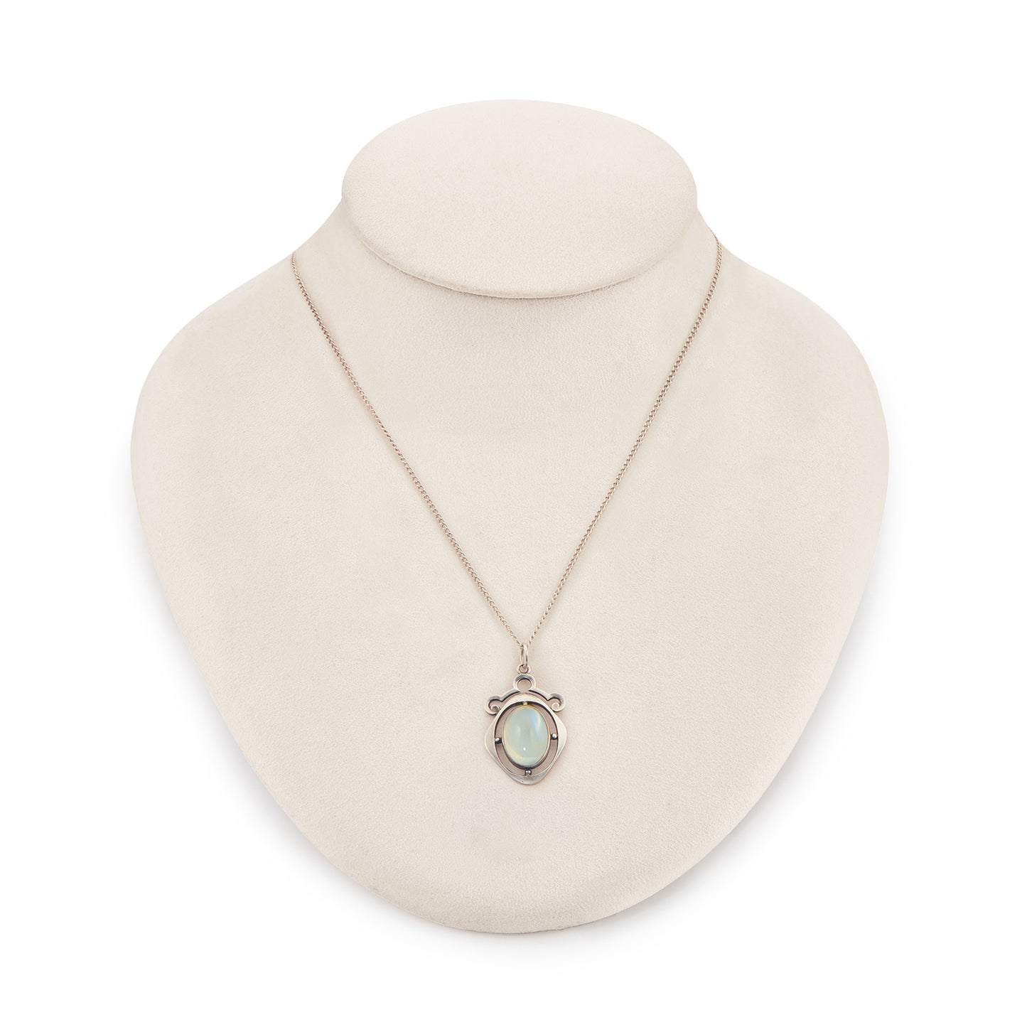 Classic 1930s sterling silver pendant set with a beautiful cabochon oval moonstone on a later silver chain.