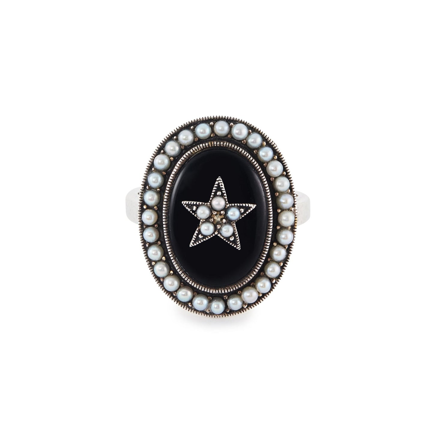 Lovely vintage sterling silver ring with an oval onyx stone, set with a star in the centre and a seed pearl surround.