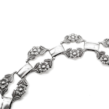 Stunning sterling silver Peruvian necklace with flower motif.