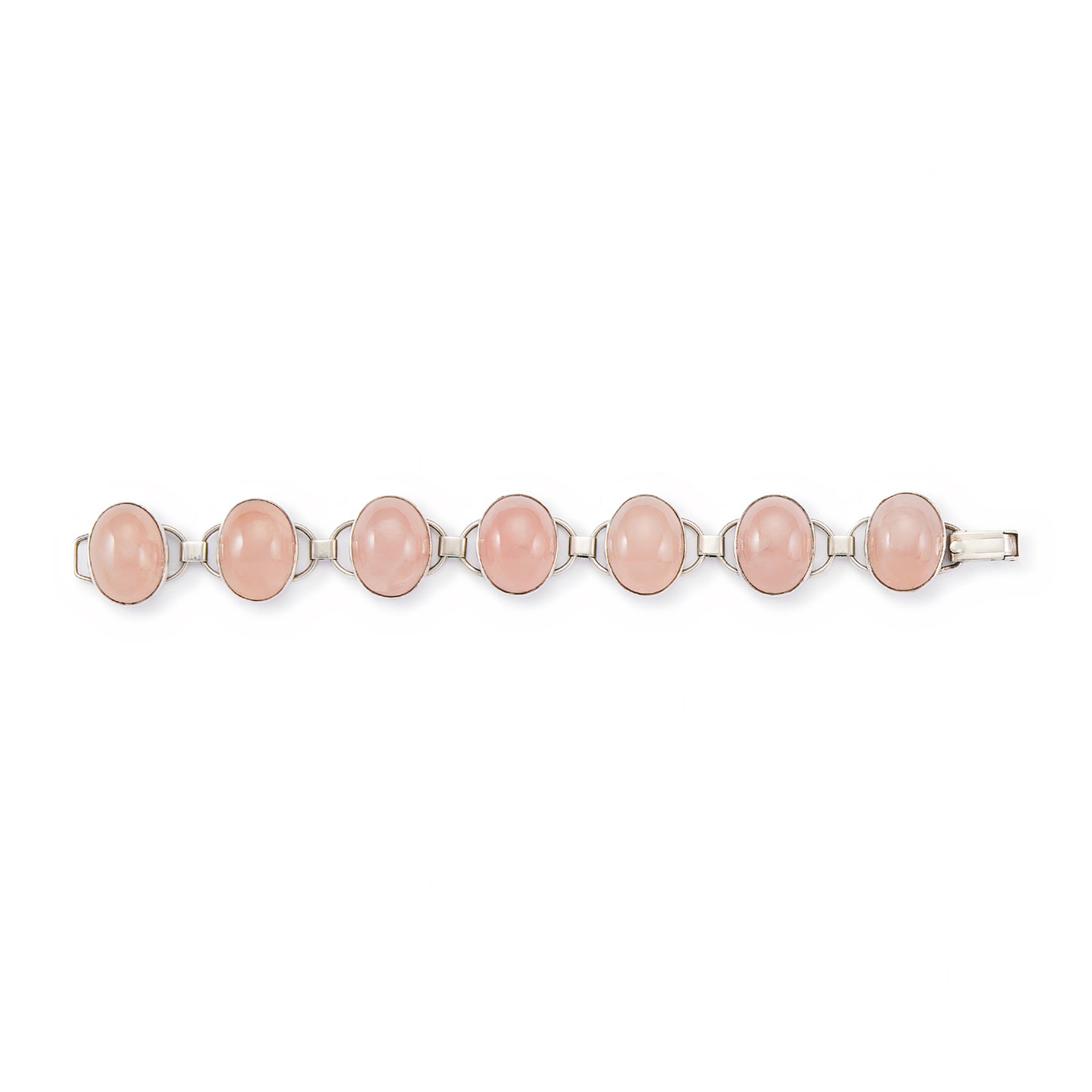 Lovely sterling silver articulated mid-century bracelet set with seven rose quartz cabochon stones. There is oxidation on the back of the bracelet.