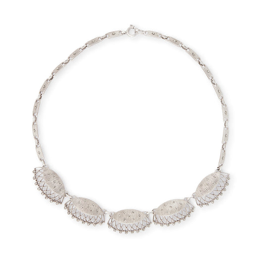 Classic sterling silver marcasite choker necklace with a scallop design. Made by Theodor Fahner.