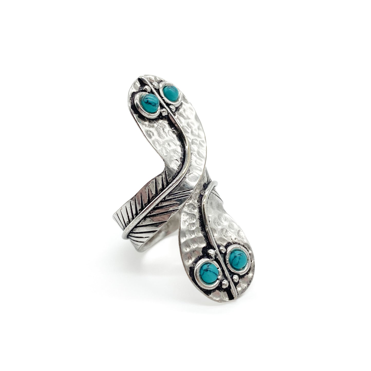 Charming handmade sterling silver snake ring with turquoise eyes. Size adjustable.