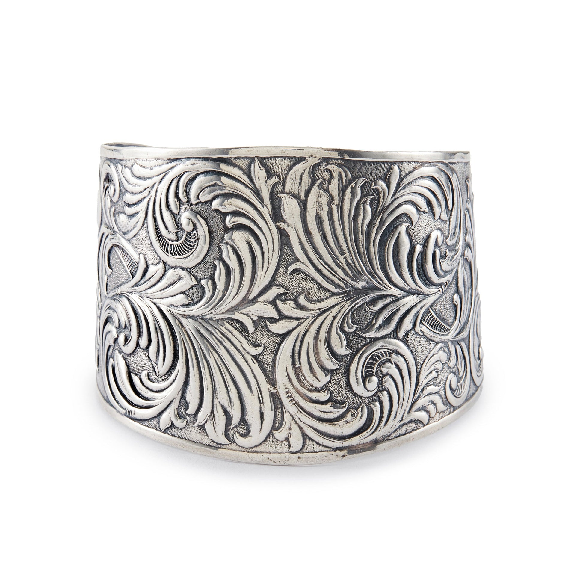 Beautifully embossed, large open sterling silver Candida bangle. Size adjustable
Hallmarked: Candida Sterling Silver