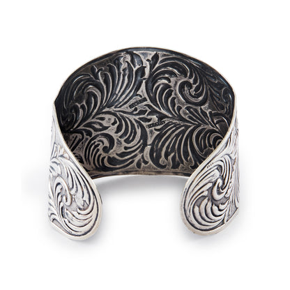 Beautifully embossed, large open sterling silver Candida bangle. Size adjustable
Hallmarked: Candida Sterling Silver