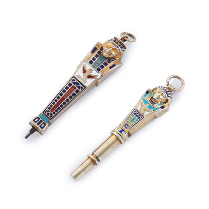 Set of two highly collectible, beautifully enamelled Egyptian Pharaoh pendants, one is a working pencil with the lead intact.