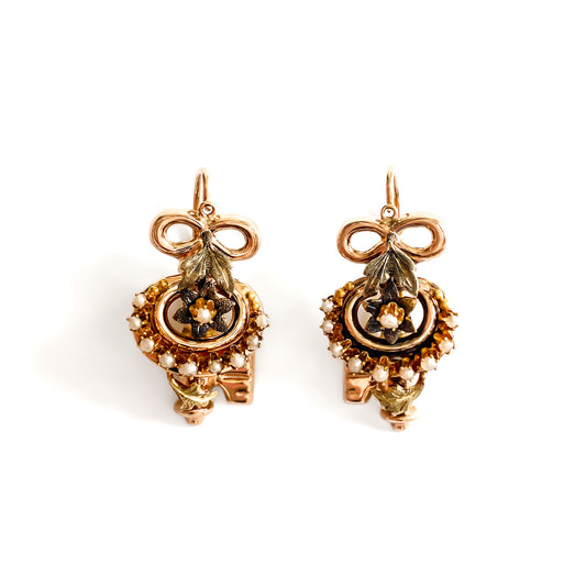 Exquisite Victorian rose and yellow gold earrings each set with ten tiny seed pearls. Front fastening shepherd hooks.