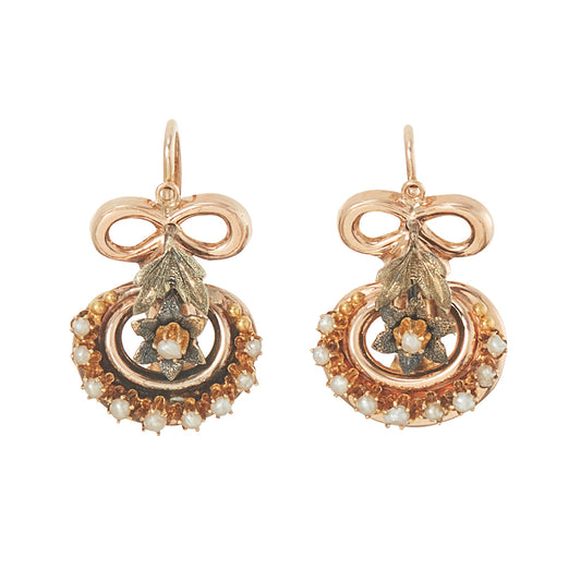 Exquisite Victorian rose and yellow gold earrings each set with ten tiny seed pearls. Front fastening shepherd hooks.