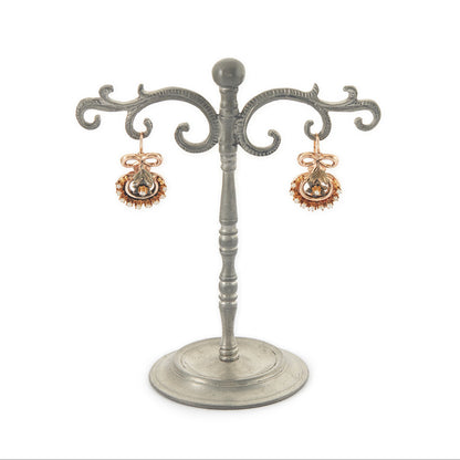 Exquisite Victorian rose and yellow gold earrings each set with ten tiny seed pearls. Front fastening shepherd hooks.