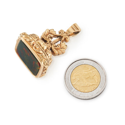 Stunning, chunky Victorian 15ct gold-cased fob seal set with a striking bloodstone, surrounded by intricate engraving.