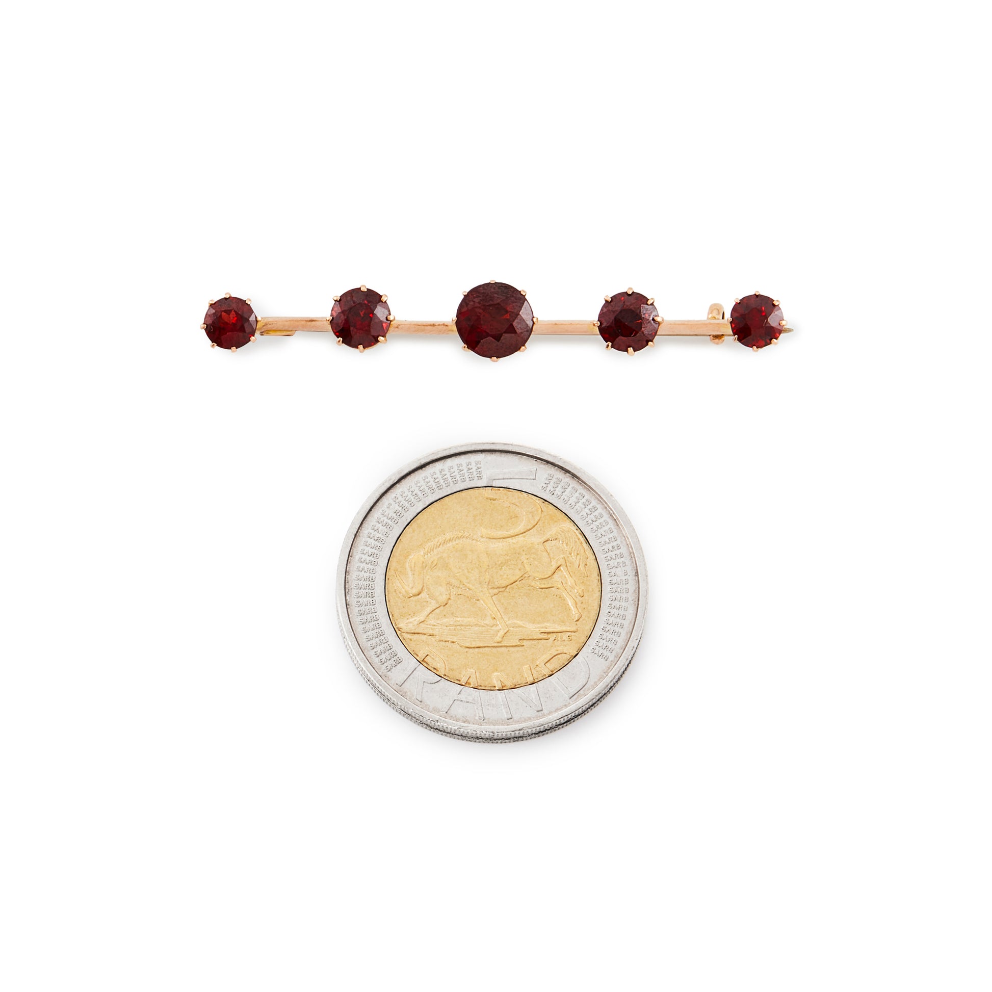 Classic 15ct rose gold Victorian bar brooch set with five beautifully faceted deep red garnets.