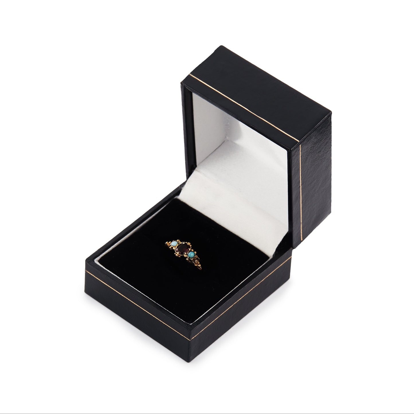 Delicate Victorian 15ct gold three stone ring set with two small opal cabochons and a faceted rhodolite garnet.