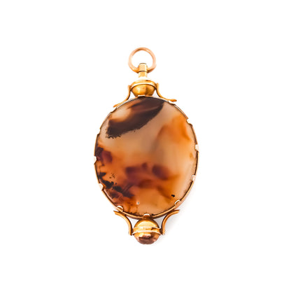 Classic 15ct yellow gold Victorian pendant set with a large oval brown moss agate disk.