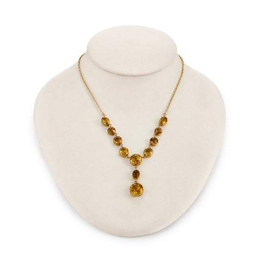 Regal Victorian 15ct rose gold necklace set with eleven beautifully faceted, deep honey coloured citrines in claw settings.