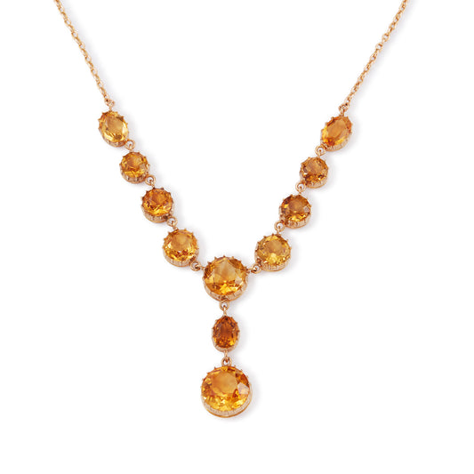 Regal Victorian 15ct rose gold necklace set with eleven beautifully faceted, deep honey coloured citrines in claw settings.
