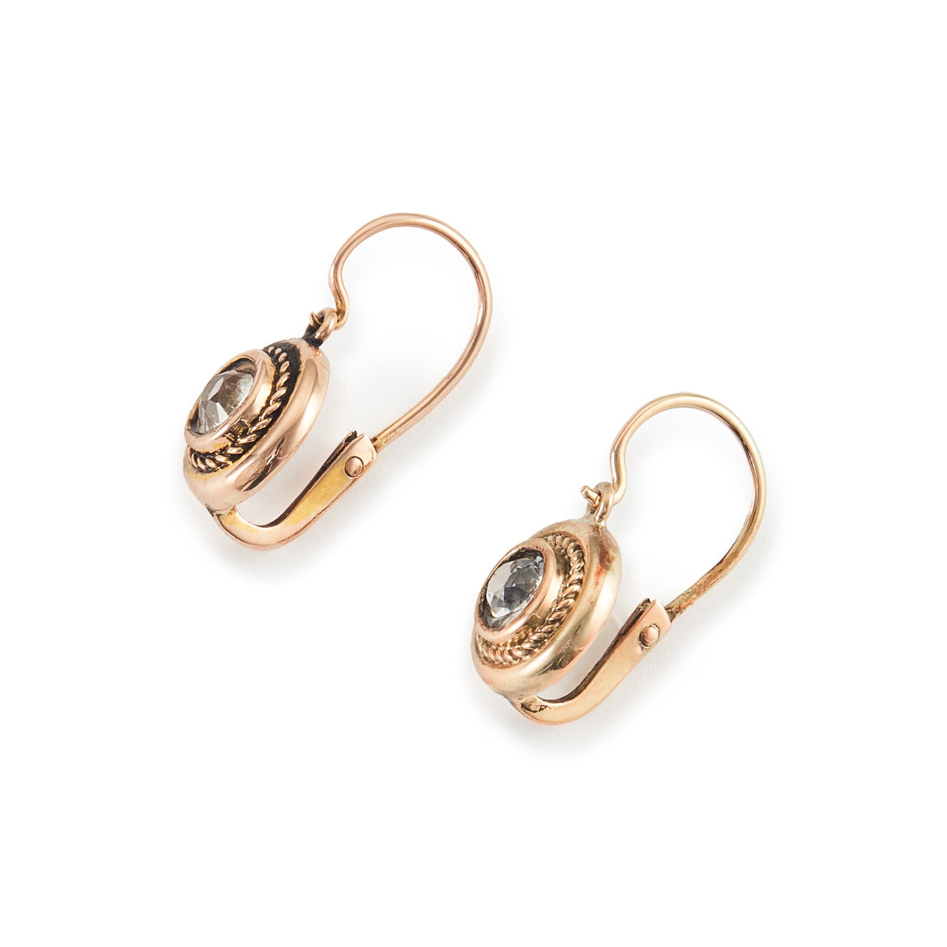 Elegant Victorian 15ct rose gold drop earrings, each set with a faceted white spinel in a rope design.