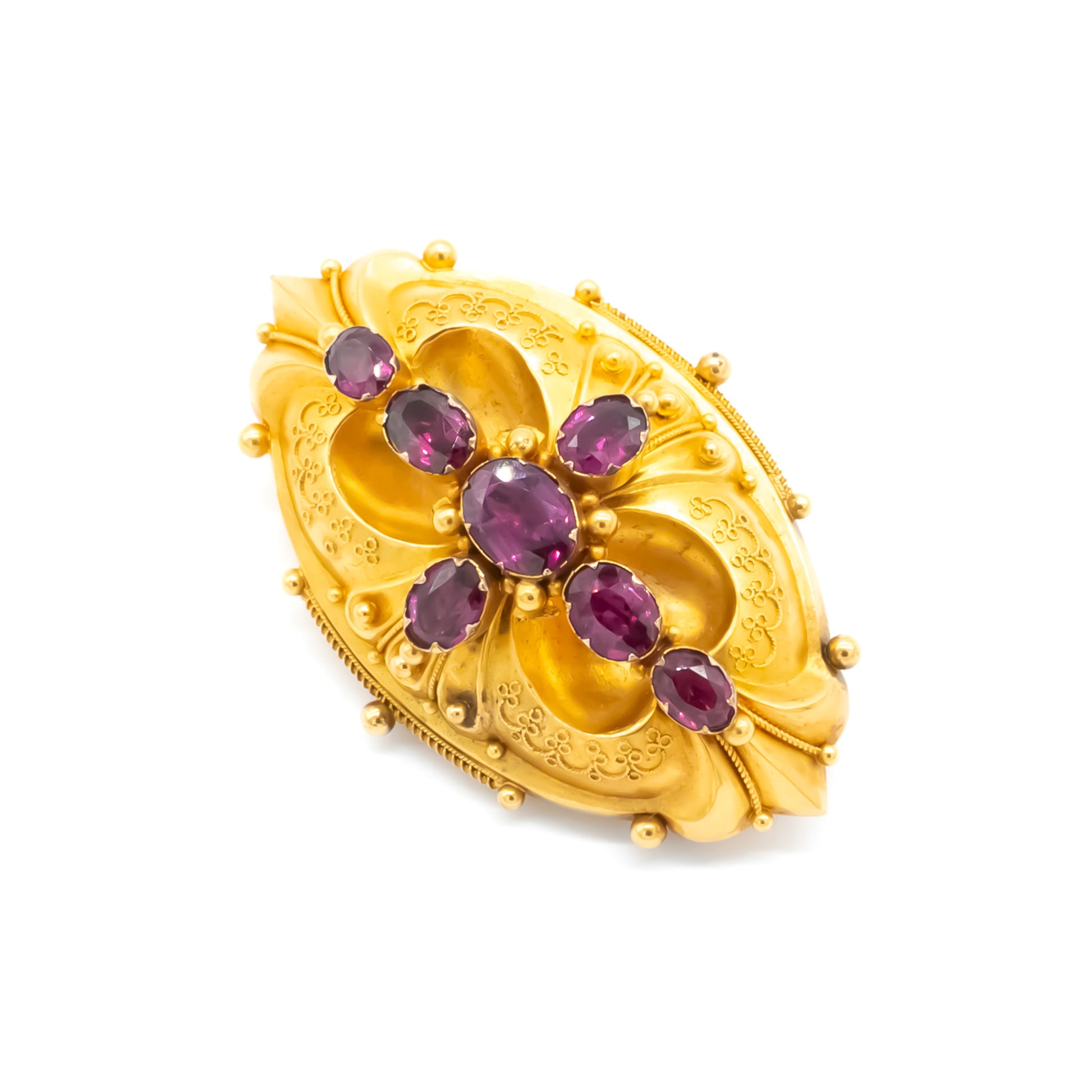 Magnificent Victorian 18ct yellow gold Etruscan brooch set with seven beautifully faceted purplish-red almandine garnets.