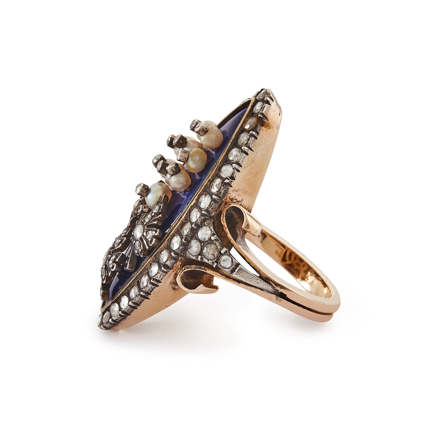 Magnificent and unusual Victorian marquise-shaped 18ct rose gold and silver blue enamel ring. The ring is accented with nine riveted pearls topped with diamonds and three riveted diamond-encrusted leaves. The piece also has rough-cut diamonds around the rim and shoulders. A real statement piece!
