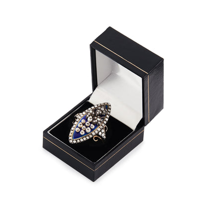 Magnificent and unusual Victorian marquise-shaped 18ct rose gold and silver blue enamel ring. The ring is accented with nine riveted pearls topped with diamonds and three riveted diamond-encrusted leaves. The piece also has rough-cut diamonds around the rim and shoulders. A real statement piece!