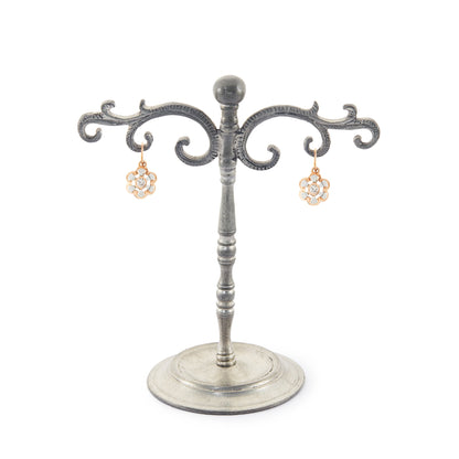 Dainty Victorian 9ct rose and white gold flower-shaped earrings, each set with a sparkling 0.08ct diamond.