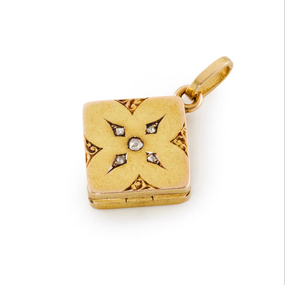 Pretty little Victorian 9ct gold locket set with five mine-cut diamonds, with ornate engraving.