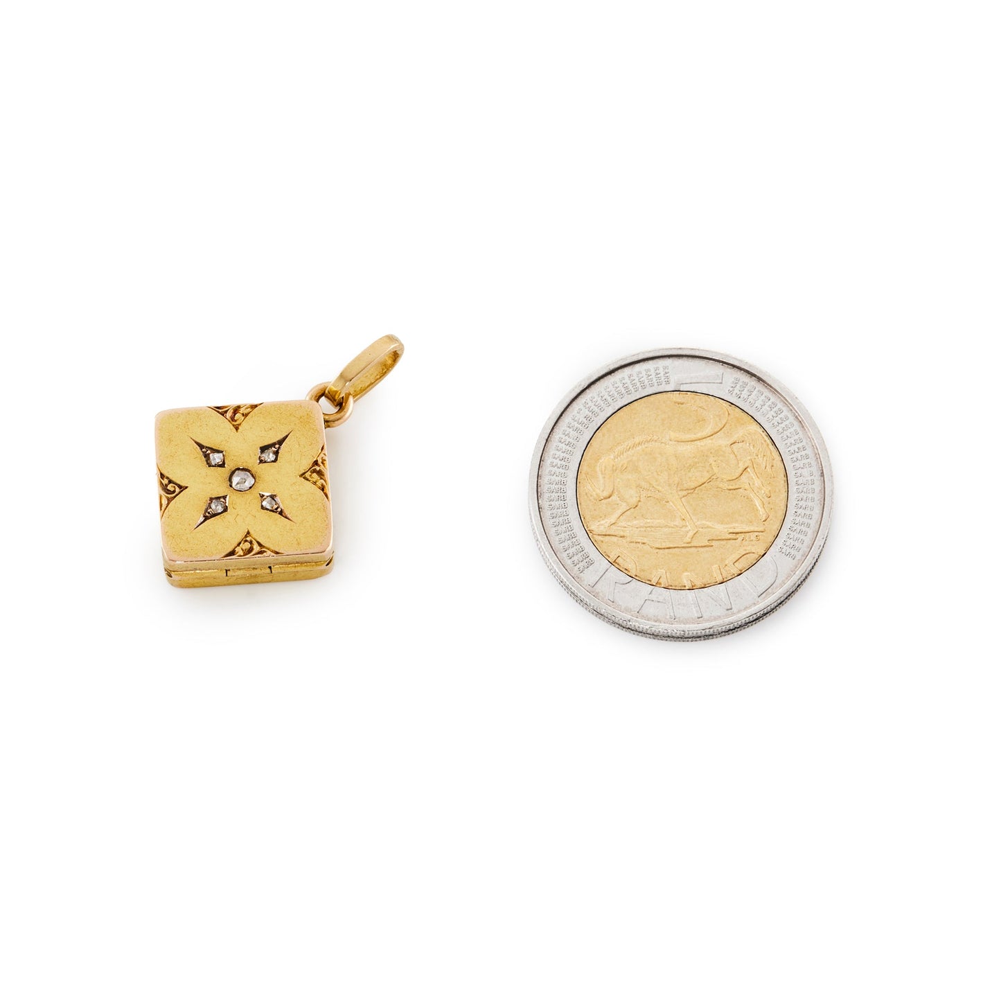 Pretty little Victorian 9ct gold locket set with five mine-cut diamonds, with ornate engraving.