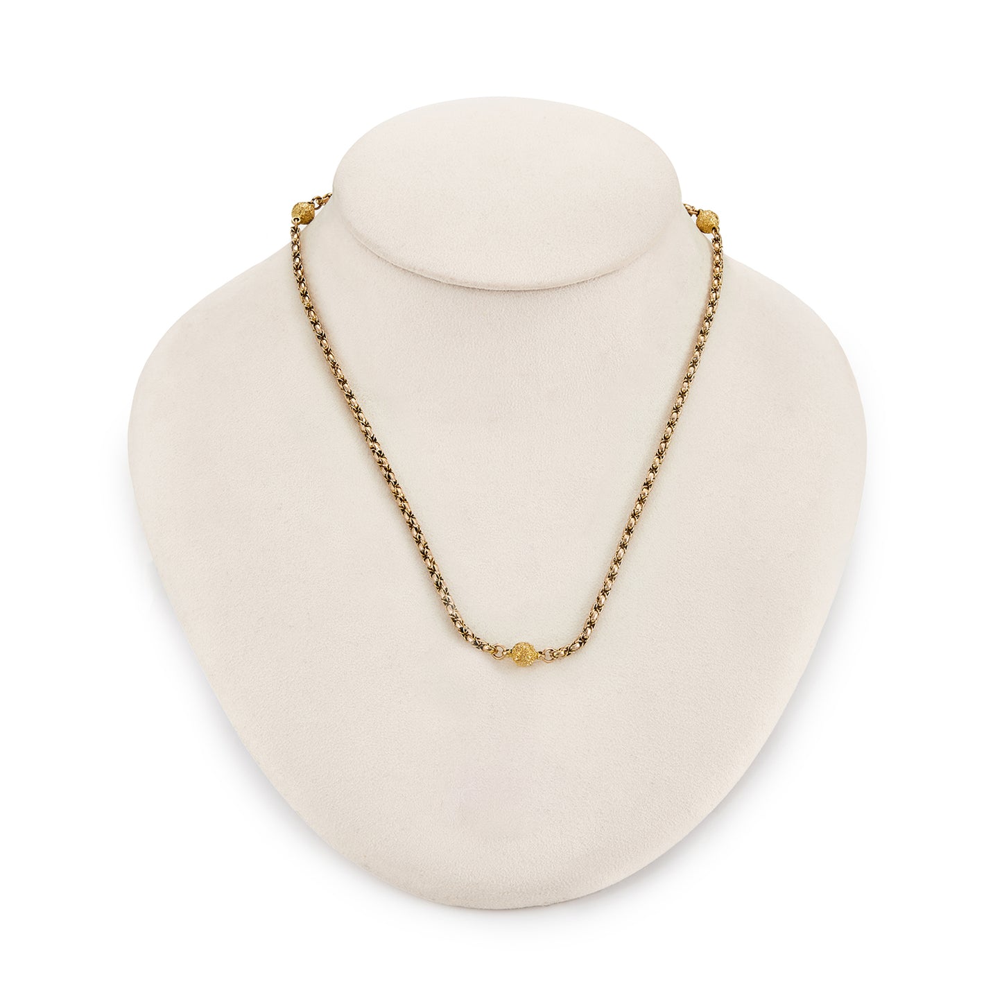 Lovely Victorian 9ct rose and yellow gold fancy rope link chain, accented with three textured ball connectors.