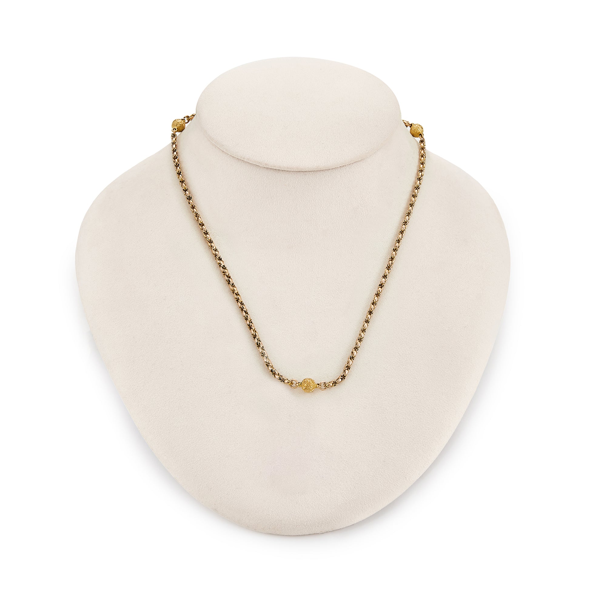 Lovely Victorian 9ct rose and yellow gold fancy rope link chain, accented with three textured ball connectors.