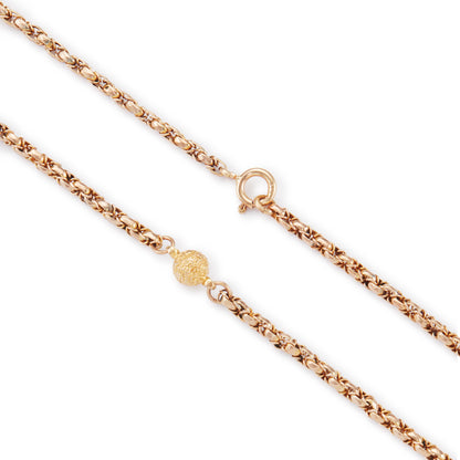 Lovely Victorian 9ct rose and yellow gold fancy rope link chain, accented with three textured ball connectors.