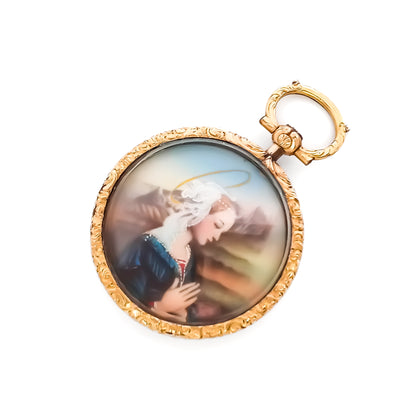 Pretty Victorian hand painted miniature under glass in a beautifully engraved 9ct gold setting.